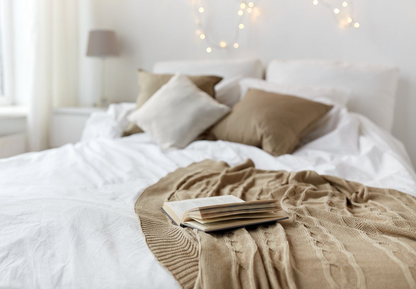 Bedroom with Bed and Christmas Garland